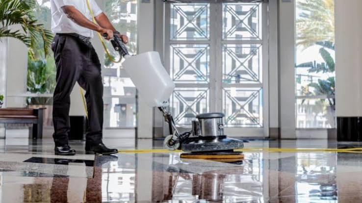 Commercial floor cleaning with a floor buffer in a Charlotte office lobby