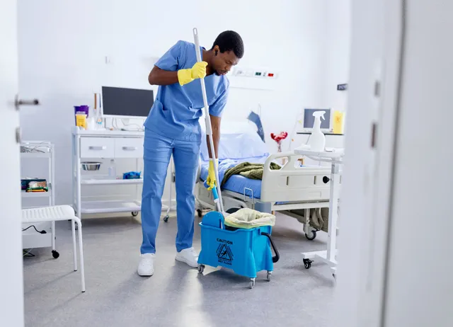 Medical center room being cleaned by trained staff in Charlotte